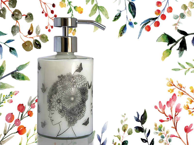 Customizable glass lotion bottle with botanical illustration and floral border, representing ORY Skincare’s personalized skincare packaging designed to reflect individual style, ritual, and self-expression.