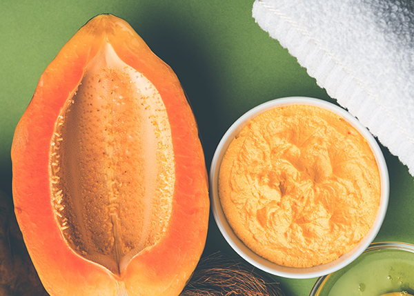 Natural face scrub made with botanical ingredients and fruit enzymes, shown as part of ORY Skincare’s exfoliating skincare routine.