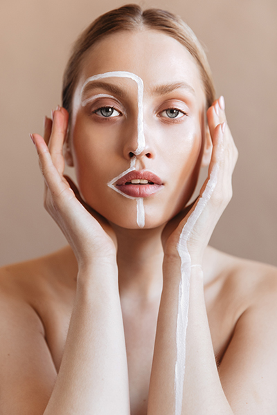 beauty_photoshoot_cleanser_combination_skin Woman highlighting T-zone and dry areas on face — ORY Skincare balancing cleanser for combination skin.