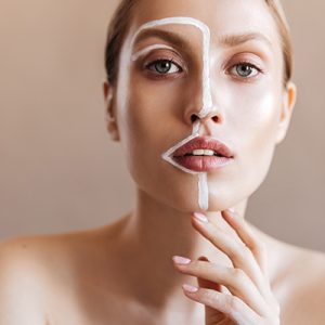 Woman with combination skin highlighting T-zone and dry areas — ORY Skincare balancing toner for combination skin.